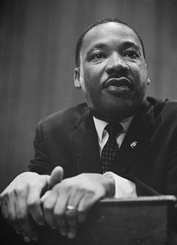 250px-Martin-Luther-King-1964-leaning-on-a-lectern